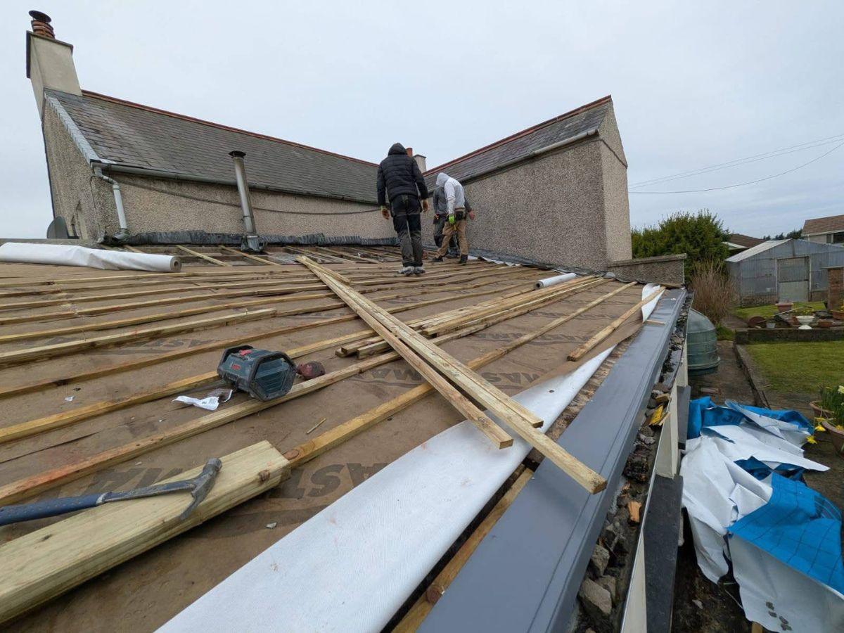 Complete roof replacement: before